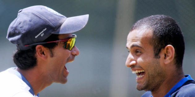 Bangalore, INDIA: Indian cricketer Mohammed Kaif (L) enjoys a light moment with teammate Irfan Pathan during a practice session at the National Cricket Academy (NCA) in Bangalore 01 September 2006. The Indian cricket team is holding a nine-day-long training camp in preparation for the forthcoming tri-series with Australia and The West Indies in Malaysia in the southern Indian city. AFP PHOTO/Dibyangshu SARKAR (Photo credit should read DIBYANGSHU SARKAR/AFP/Getty Images)