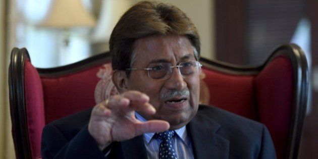 To go with Pakistan-unrest-politics-Afghanistan-India,INTERVIEW by Guillaume LAVALLÃE In this photograph taken November 14, 2014, Pakistan's former military ruler General Pervez Musharraf gestures during an interview with AFP in Karachi. The departure of NATO combat forces from Afghanistan could push India and Pakistan towards a proxy war in the troubled state Musharraf warned in an interview with AFP. AFP PHOTO / Asif HASSAN (Photo credit should read ASIF HASSAN/AFP/Getty Images)