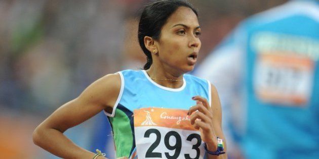 Kavita Raut of India compete in the women's 5,000m final in the athletics competition at the 16th Asian Games in Guangzhou on November 26, 2010. AFP PHOTO / FRANCOIS XAVIER MARIT (Photo credit should read FRANCOIS XAVIER MARIT/AFP/Getty Images)