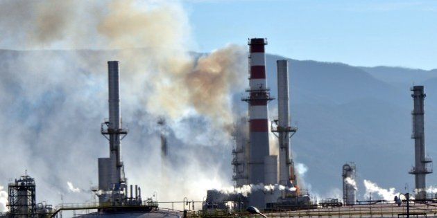 KOCAELI, TURKEY - FEBRUARY 3: Smoke rises over the Tupras, Turkeys only oil refiner, Izmit Refinery after a blaze caused by the breakdown of the equipments in Kocaeli, Turkey on February 3, 2016. (Photo by Kadir Yildiz/Anadolu Agency/Getty Images)