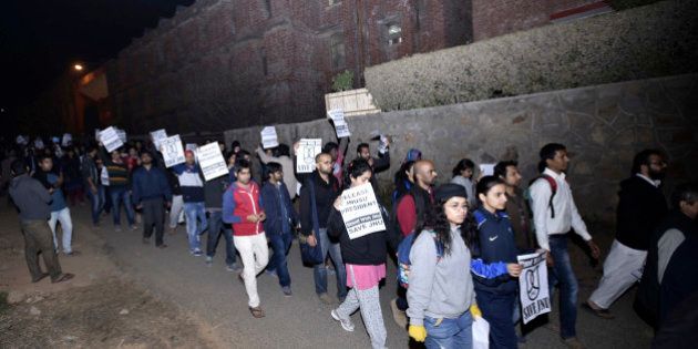 NEW DELHI, INDIA - FEBRUARY 12: JNU teachers and students protest march inside JNU Campus against arrest of JNU students union president Kanhaiya Kumar on February 12, 2016 in New Delhi, India. JNU students union president Kanhaiya Kumar was arrested on in connection with a case of sedition and criminal conspiracy over holding of an event at the prestigious institute against hanging of Parliament attack convict Afzal Guru in 2013. A group of students on Tuesday held an event on the JNU campus and allegedly shouted slogans against India. (Photo by Arun Sharma/Hindustan Times via Getty Images)