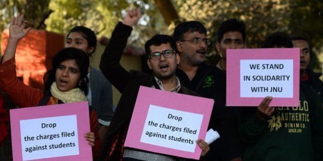Indian students hold placards during a protest aganist the arrest of the president of Jawaharlal Nehru University's Student Union (JNU) Kanhaiya Kumar in New Delhi on February 14, 2016. Indian students,teachers and activists are protesting against the arrest of a top university student leader after he was charged with sedition, and demanding his immediate release. AFP PHOTO / SAJJAD HUSSAIN / AFP / SAJJAD HUSSAIN (Photo credit should read SAJJAD HUSSAIN/AFP/Getty Images)