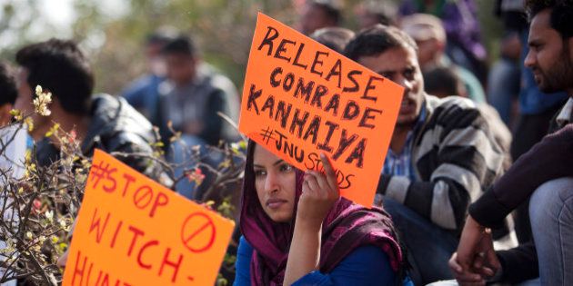 An Indian student holds a placard demanding the release of student leader Kanhaiya Kumar during a protest at the Jawaharlal Nehru University in New Delhi, India, Tuesday, Feb. 16, 2016. Students, journalists and teachers protested in the Indian capital Tuesday after a student union leader's arrest and subsequent violence by Hindu nationalists. The uproar has once again sparked allegations that Prime Minister Narendra Modi's government and his Hindu nationalist Bharatiya Janata Party are displaying intolerance and cracking down on political dissent in the name of patriotism. (AP Photo /Tsering Topgyal)