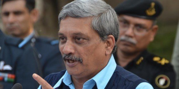 PATHANKOT, INDIA - JANUARY 5: Defence Minister Manohar Parrikar addressing the media after a visit to the Pathankot Air Base that was under siege from Saturday morning on January 5, 2016 in Pathankot, India. Defence Minister said the terrorists were neutralised in an operation that was over in 38 hours but combing operations are still on and may continue for a day or two. (Photo by Sameer Sehgal/Hindustan Times via Getty Images)