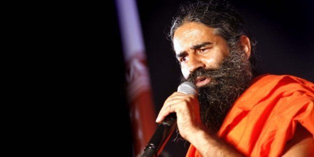 NEW DELHI, INDIA - OCTOBER 9: Yoga Guru Baba Ramdev addresses during a press conference on October 9, 2015 in New Delhi, India. Future Group tied up with Yoga Guru Baba Ramdev's Patanjali Ayurved to sell the latter's products. (Photo by Arun Sharma/Hindustan Times via Getty Images)