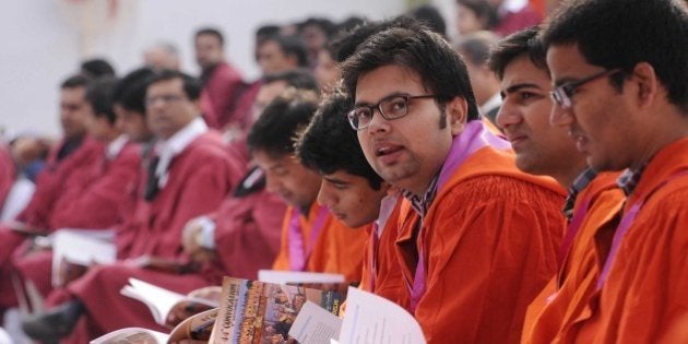 NEW DELHI, INDIA - NOVEMBER 9: IIT students during the 44th annual convocation of the Indian Institute of Technology-Delhi (IIT-D) on November 9, 2013 in New Delhi, India. President Pranab Mukherjee said lack of enthusiasm to pursue higher studies does not auger well for the country. (Photo By Sunil Saxena/Hindutan Times via Getty Images)