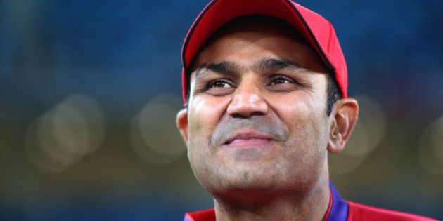DUBAI, UNITED ARAB EMIRATES - JANUARY 28: Virender Sehwag of Gemini Arabians looks on during the opening match of the Oxigen Masters Champions League 2016 between Libra Legends and Gemini Arabians at the International Cricket Stadium on January 28, 2016 in Dubai, United Arab Emirates. (Photo by Francois Nel/Getty Images)