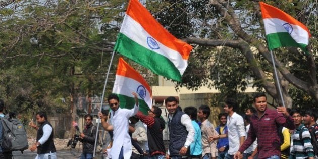 INDORE, INDIA - FEBRUARY 16: ABVP members stage demonstration against the anti-national voices raised in JNU recently at Devi Ahilya Vishwavidyalaya campus on February 16, 2016 in Indore, India. JNU has been on the boil over the arrest of its student's Union President Kanhaiya Kumar on sedition charges after some students organised a meet to mark the anniversaries of executions of Parliament attack convict Afzal Guru. (Photo by Shankar Mourya/Hindustan Times via Getty Images)