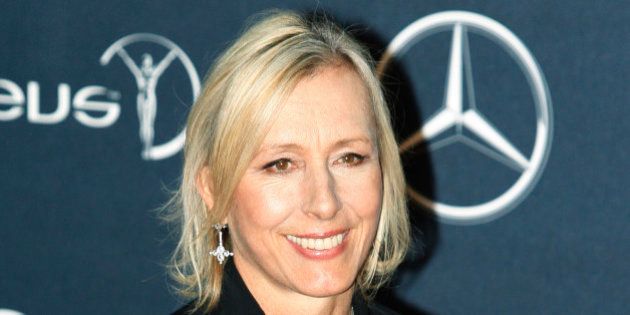 FILE - In this Feb. 6, 2012 file photo, former tennis player Martina Navratilova, arrives for the Laureus World Sports Awards in London. Navratilova will be among the 12 celebrity contestants on the next season of the ABC dancing competition, premiering March 19. (AP Photo/Lefteris Pitarakis, file)