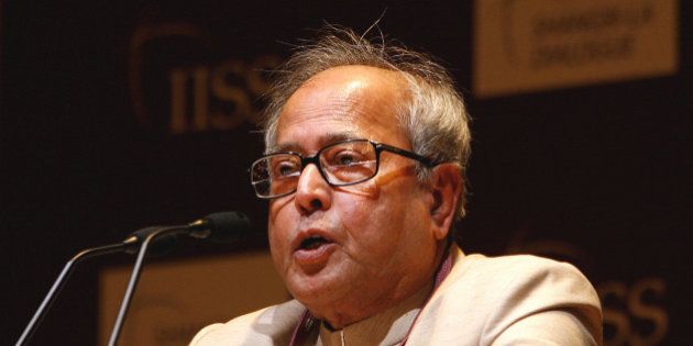 Pranab Mukherjee, India's Minister of Defense, delivers his keynote speech at the 5th Asia Security Summit, in Singapore Saturday, June 3, 2006. In remarks prepared for delivery to a gathering of military leaders from the region, Rumsfeld pledged that the United States will stay involved in Southeast Asia. He pointed to improved relationships between the United States and Japan, India, Indonesia, South Korea and Pakistan. (AP Photo/Kin Cheung)