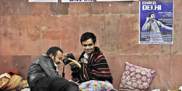 NEW DELHI, INDIA - FEBRUARY 23: JNU Student Umar Khalid at JNU Campus on night of February 23, 2016 in New Delhi, India. Five JNU students Umar Khalid, Anant Prakash Narayan, Ashutosh Kumar, Rama Naga and Anirban Bhattacharya accused of sedition reappeared on the campus on Sunday, having spent 10 days in hiding. The five students are accused of allegedly planning an event on February 9 against the hanging of Parliament attack convict Afzal Guru, where anti-national slogans were allegedly shouted. (Photo by Sanjeev Verma/ Hindustan Times via Getty Images)