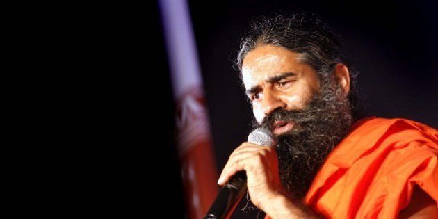 NEW DELHI, INDIA - OCTOBER 9: Yoga Guru Baba Ramdev addresses during a press conference on October 9, 2015 in New Delhi, India. Future Group tied up with Yoga Guru Baba Ramdev's Patanjali Ayurved to sell the latter's products. (Photo by Arun Sharma/Hindustan Times via Getty Images)