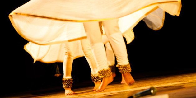 Kathak is an classical Indian dance form, which involves rapid hand and feet movements, in sync with the beats of the music. Though the dance has many forms, it typically has faster beats than some other classical dances.Here a kathak dancer is seen jumping in air with the beats of the music.