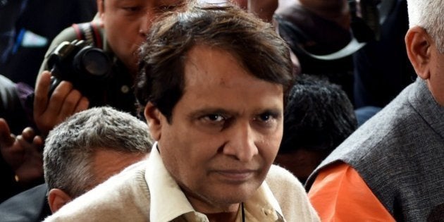 India's Railways Minister Suresh Prabhu enters Parliament House in New Delhi on February 25, 2016, ahead of releasing The Railways Budget. AFP PHOTO/Money SHARMA / AFP / MONEY SHARMA (Photo credit should read MONEY SHARMA/AFP/Getty Images)