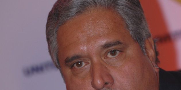 BANGALORE, INIDA APRIL 7: Vijay Mallya, Chairman UB Group has announced that it has crossed the milestone of clocking the sales volume of 100 million cases for the fiscal year ended April 7, 2010 in Bangalore, India. (Photo by Hemant Mishra/Mint via Getty Images)