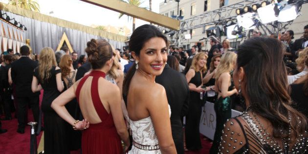 Priyanka Chopra arrives at the Oscars on Sunday, Feb. 28, 2016, at the Dolby Theatre in Los Angeles. (Photo by Matt Sayles/Invision/AP)