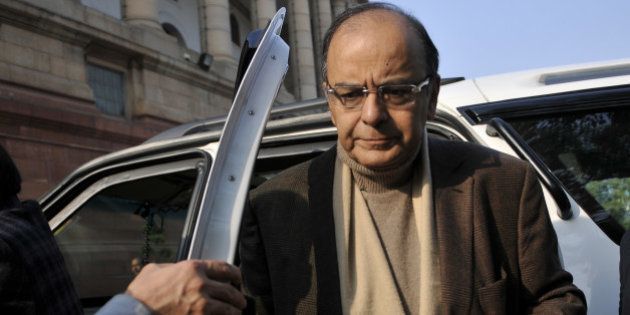 NEW DELHI, INDIA - DECEMBER 21: Finance Minister Arun Jaitley arrives at Parliament from the Patiala Court after filling defamation cases against AAP leaders on December 21, 2015 in New Delhi, India. As pressure mounted on it for early passage of the Juvenile Justice Bill, the government today listed the crucial legislation in Rajya Sabha for passage tomorrow and blamed Congress for blocking it in the past due to its obstructionist politics even when it was listed on 15 occasions. (Photo by Vipin Kumar/Hindustan Times via Getty Images)