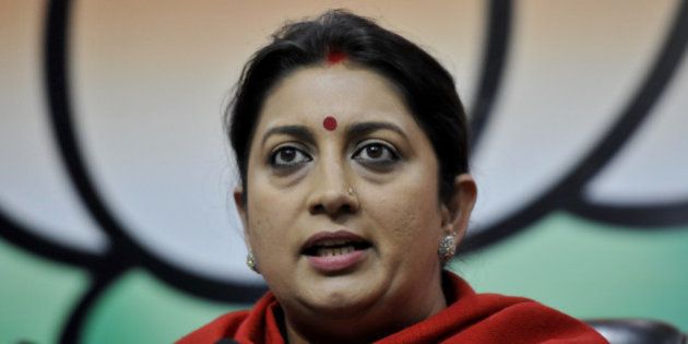 NEW DELHI, INDIA - DECEMBER 17: Union HRD Minister Smriti Irani speaking to media personnel at BJP Head Office to defend the allegation regarding DDCA against Finance Minister Arun Jaitley by the AAP party on December 17, 2015 in New Delhi, India. The Aam Aadmi Party claimed that the main objective of the raid of the Central Bureau of Investigation (CBI) at the Delhi Secretariat was to prevent the alleged graft taking place in the District Cricket Association (DDCA) during Finance Minister Arun Jaitleyâs tenure as its President from coming to light. (Photo by Vipin Kumar/Hindustan Times via Getty Images)