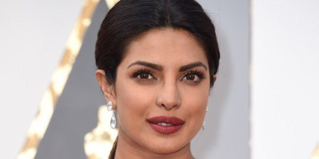 Priyanka Chopra arrives on the red carpet for the 88th Oscars on February 28, 2016 in Hollywood, California. AFP PHOTO / VALERIE MACON / AFP / VALERIE MACON (Photo credit should read VALERIE MACON/AFP/Getty Images)