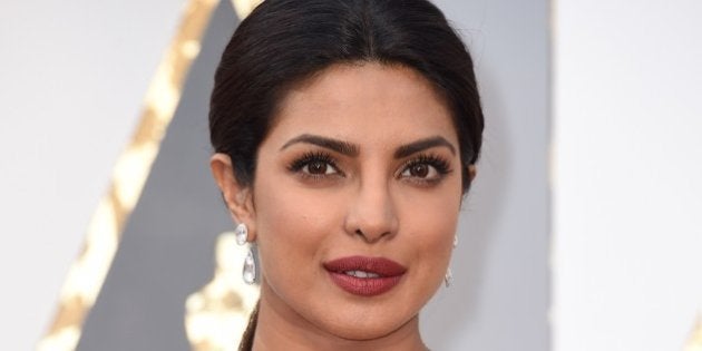 Priyanka Chopra arrives on the red carpet for the 88th Oscars on February 28, 2016 in Hollywood, California. AFP PHOTO / VALERIE MACON / AFP / VALERIE MACON (Photo credit should read VALERIE MACON/AFP/Getty Images)