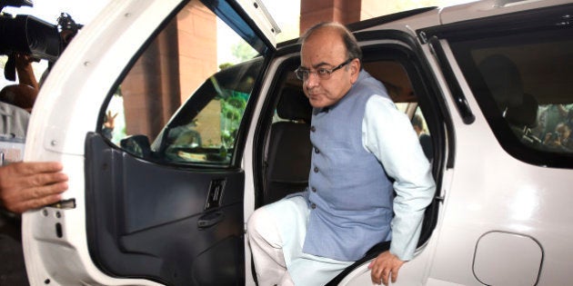 NEW DELHI, INDIA - FEBRUARY 29: Finance Minister Arun Jaitley arrives at Parliament House ahead of release of the General Budget on February 29, 2016 in New Delhi, India. Presenting his third Union Budget, Finance Minister Arun Jaitley announced a slew of schemes, and income tax exemptions for small tax-payer and the small investors. Aiming to double farmersâ income by 2022, the minister also announced an allocation of nearly Rs. 36,000 crore for the farm sector while raising the agri-credit target to Rs. 9 lakh crore for the next fiscal. Growth of Indian Economy accelerated to 7.6% in 2015-16. (Photo by Sonu Mehta/Hindustan Times via Getty Images)