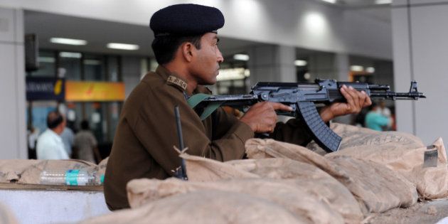 An Indian Central Industrial Security Force (CISF) Jawan stands guard at the Sardar Vallabhbhai Patel International Airport in Ahmedabad on January 22, 2010. Security was further strengthened in airports across India January 22 and sky marshals ordered on flights after intelligence reports that terror groups might target an Air India flight operating from a South Asian country. The civil aviation ministry has also advised all states to beef up security at all vital installations, while the home ministry has asked the states to take special measures to protect VIPs and other distinguished people at airports. AFP PHOTO/ Sam PANTHAKY (Photo credit should read SAM PANTHAKY/AFP/Getty Images)