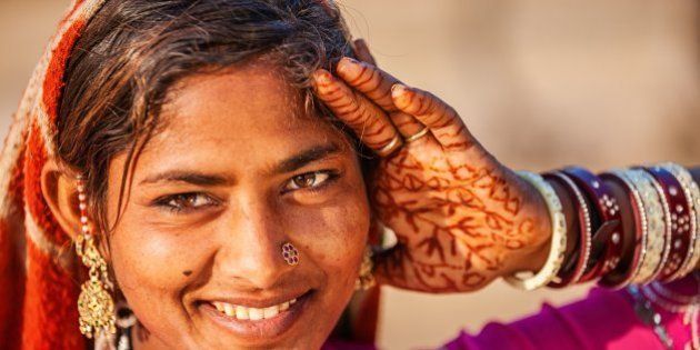 Young Indian woman in desert village