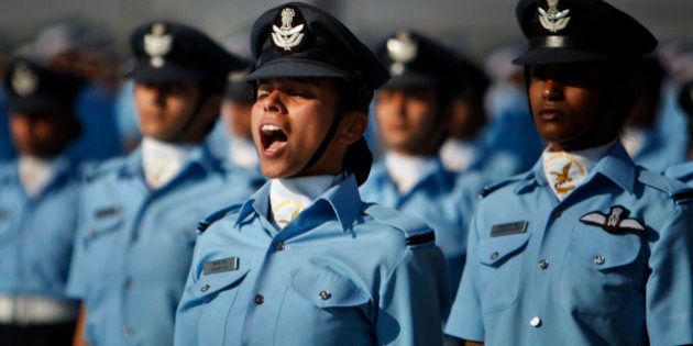 Indian Air Force (IAF) cadets march during their passing out ceremony at the Air Force Academy in Dundigal, 40 kilometers (25 miles) north of Hyderabad, India, Saturday, Dec. 14, 2013. A total of 202 personnel including 37 women graduated as flight cadets on Saturday from the academy reputed to be the premier training institution of IAF, a press release said. (AP Photo/Mahesh Kumar A.)