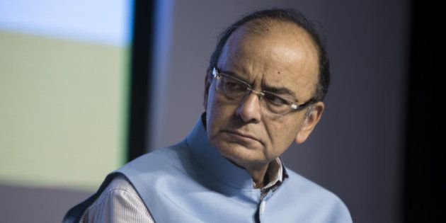 Arun Jaitley, India's finance minister, pauses during a news conference in Gurgaon, India, on Saturday, March 5, 2016. India needs strong banks rather than a numerically larger number of lenders, Jaitley says at conclusion of bankers retreat near New Delhi. Photographer: Udit Kulshrestha/Bloomberg via Getty Images