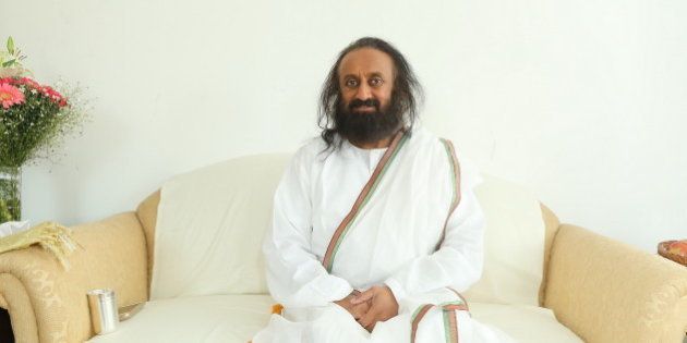 NOIDA, INDIA - FEBRUARY 5: (EDITORâS NOTE: This is an exclusive shoot of Hindustan Times) Indian Spiritual leader and founder of The Art of Living Foundation Sri Sri Ravi Shankar during an exclusive interview on February 5, 2016 IN Noida, India. The spiritual leader spoke to HT on the occasion of Art of Living completing 35 years of service to humanity as an educational and humanitarian movement. He revealed plans to host the World Culture Festival in Delhi from March 11 to March 13. The event will see participation from more than 35,000 artists and over 3.5 million people from over 155 countries, to give out the message that the whole world is one family and that we can all co-exist with our differences. (Photo by Raajessh Kashyap/Hindustan Times via Getty Images)