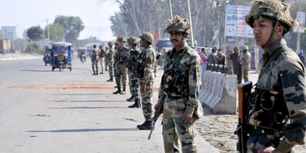 PANIPAT, INDIA - FEBRUARY 22: Army jawans deployed at village Siwah after Jat agitation turned violent on February 22, 2016 in Panipat, India. Jats are agitating for quotas in jobs and want to be counted as a part of Other Backward Classes, a section that has 27% quotas in government jobs. (Photo by Parveen Kumar/Hindustan Times via Getty Images)