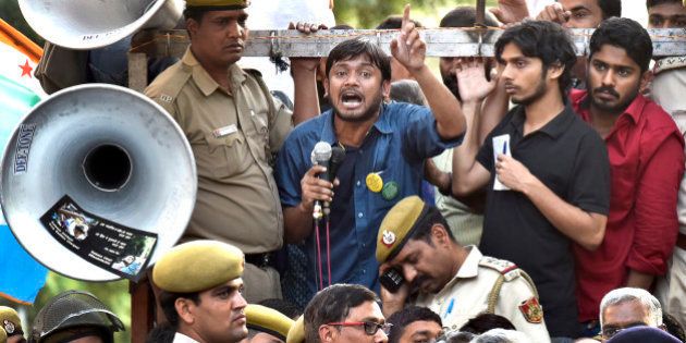 NEW DELHI, INDIA - MARCH 15: JNUSU President Kanhaiya Kumar speaks the gathering after the march from Mandi House to Parliament today to demand the release of Umar Khalid and Anirban Bhattacharya on March 15, 2016 in New Delhi, India. The JNU or Jawaharlal Nehru University has sent notice to 21 students including Kanhaiya Kumar over a controversial February 9 event in support of Parliament attack convict Afzal Guru, in which anti-India slogans were raised. Kanhaiya Kumar, charged with sedition for his alleged role in the event, was released from jail earlier this month after three weeks in jail. Two others, Umar Khalid and Anirban Bhattacharya, are still in jail.(Photo by Vipin Kumar/Hindustan Times via Getty Images)