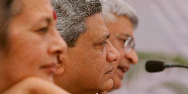Communist Party of India (Marxist), or CPI(M) leaders, from left to right, Brinda Karat, Sitaram Yechury, and Prakash Karat are seen at the release of the party manifesto ahead of general elections in New Delhi, India, Monday, March 16, 2009. Elections in India will be held in five phases beginning in April as the current government's five-year term ends. (AP Photo/Saurabh Das)