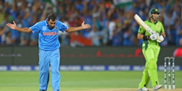 ADELAIDE, AUSTRALIA - FEBRUARY 15: Mohammed Shami of India celebrates after dismissing Misbah-ul-Haq of Pakistan during the 2015 ICC Cricket World Cup match between India and Pakistan at Adelaide Oval on February 15, 2015 in Adelaide, Australia. (Photo by Scott Barbour/Getty Images)