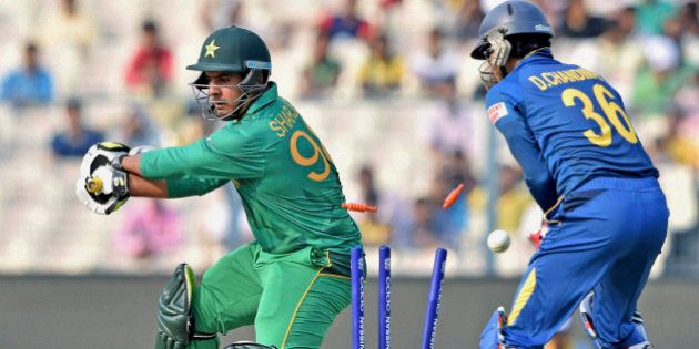 Pakistani batsman Sharjeel Khan is clean bowled during the ICC World Twenty20 2016 cricket warm up match at the Eden Garden in Kolkata, India, Monday, March 14, 2016. (Swapan Mahapatra/Press Trust of India via AP)