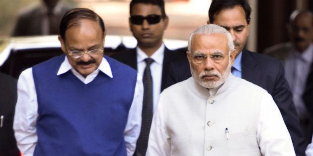 NEW DELHI, INDIA - FEBRUARY 23: Prime Minister Narendra Modi with Parliamentary Affairs Minister M. Venkaiah Naidu arrives at the start of the Budget Session of Parliament on February 23, 2016 in New Delhi, India.(Photo by Sonu Mehta/Hindustan Times via Getty Images)