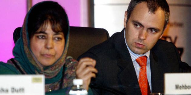 NEW DELHI, INDIA: Chairperson of the Jammu and Kashmir People's Democratic Party (PDP), Mehbooba Mufti (L) answers a question as President of the National Conference of Jammu and Kashmir, Omar Abdullah looks on during the third annual Hindustan Times Leadership Summit in New Delhi, 16 November 2005. The two-day long Hindustan Times Leadership Initiative is attended by key political and business leaders from both India and overseas, with the aim of discussing the changing dynamics between India and the world on social, economic and political issues. AFP PHOTO/RAVEENDRAN (Photo credit should read RAVEENDRAN/AFP/Getty Images)