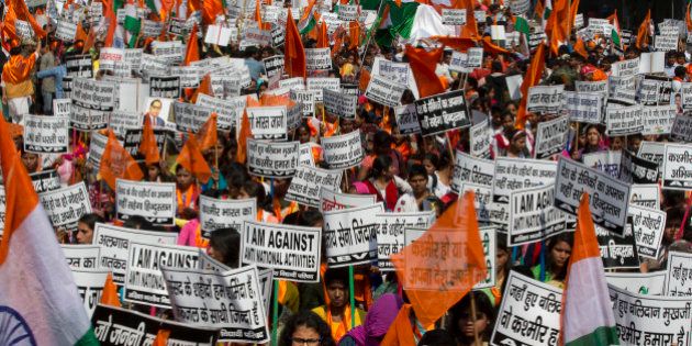 Students of the Akhil Bharatiya Vidyarthi Parishad (ABVP) or All Indian Student Council, a student wing of the ruling Bharatiya Janata party, shout pro India slogans during a march in New Delhi, India, Wednesday, Feb. 24, 2016. The students demanded strict action against those indulging in anti-national activities, especially in the light of what happened in a New Delhi university where anti-India slogans calling for the destruction of India and independence for the Indian portion of Kashmir were allegedly shouted two weeks ago. Some banners in the local language read: