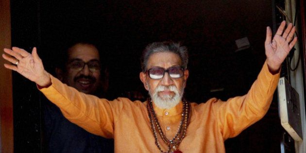 FILE- In this Jan 23, 2011 file photo, Hindu hardline Shiv Sena party leader Bal Thackeray waves at party workers gathered outside his residence on his 85th birthday in Mumbai, India. Thackeray, the extremist leader linked to waves of mob violence against Muslims and migrant workers, has died Saturday, Nov. 17, 2012, after ailing for several weeks. He was 86. (AP Photo)