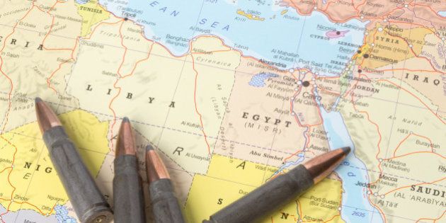 Four bullets on the geographical map of Libya and Egypt in North Africa. Conceptual image for war, conflict, violence.