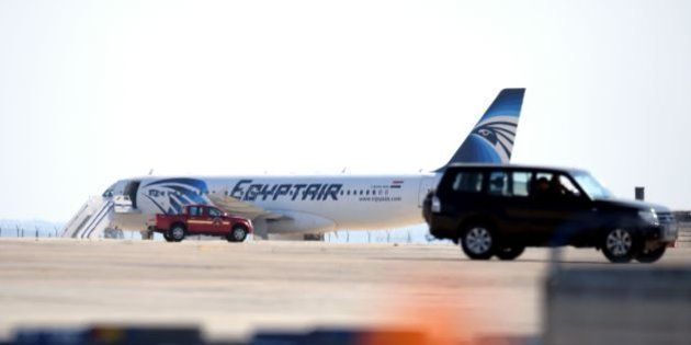 An EgyptAir Airbus A-320 sits on the tarmac of Larnaca airport after it was hijacked and diverted to Cyprus on March 29, 2016. A hijacker seized the Egyptian airliner and diverted it to Cyprus, before releasing all the passengers except four foreigners and the crew, officials and the airline said. / AFP / GEORGE MICHAEL (Photo credit should read GEORGE MICHAEL/AFP/Getty Images)