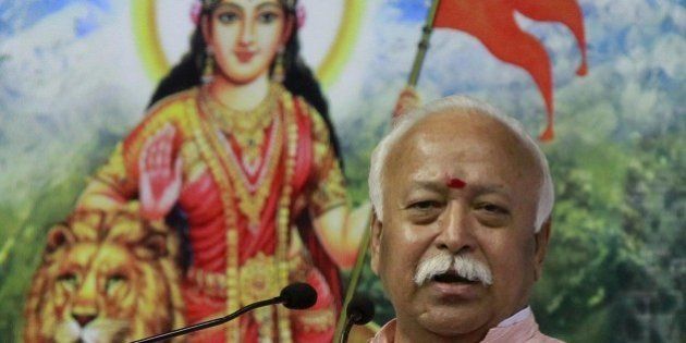 NEW DELHI, INDIA - NOVEMBER 22: Rashtriya Swayamsevak Sangh (RSS) Chief Mohan Bhagwat speaks during the condolence meeting of former Vishwa Hindu Parishad (VHP) President Ashok Singhal, in New Delhi, India, on Sunday, November 22, 2015. Singhal died at the age of 89 on November 17, 2015. Bhagwat said, âAshok ji was a pillar of unity and strength for Hindus. He has not gone but is still there in us in our memories and will continue to guide us.â (Photo by Sanjeev Verma/Hindustan Times via Getty Images)