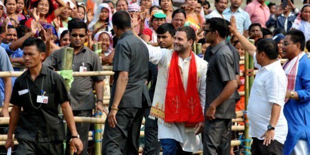 Rahul Gandhi, vice-president of the Indian National Congress party, waves to the crowd at an election rally in Diphu in Karbi Anglong on March 29, 2016, ahead of state assembly elections in Assam. Thousands of Indian voters will elect legislators for the 126 seats contested in 25,000 polling stations in the northeastern state of Assam in two phases on April 4 and 11. / AFP / Biju BORO (Photo credit should read BIJU BORO/AFP/Getty Images)