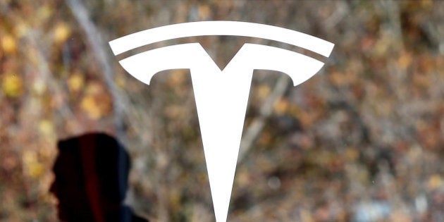 PALO ALTO, CA - NOVEMBER 05: The Tesla logo is displayed at a Tesla showroom on November 5, 2013 in Palo Alto, California. Tesla will report third quarter earnings today after the closing bell. (Photo by Justin Sullivan/Getty Images)