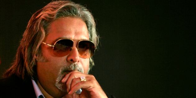 Kingfisher Airlines Chairman Vijay Mallya attends a news conference in Mumbai in this February 6, 2007 file photo. To match feature MOTOR-RACING/INDIA REUTERS/Adeel Halim/Files (INDIA)