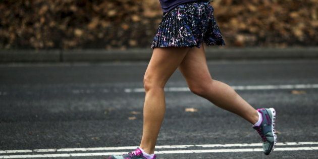 A woman jogs in her shorts during a warm day in Central Park, New York December 25, 2015. Much of the U.S. East Coast could see record high temperatures on Christmas Day and through the weekend even as a major winter storm looms for the southern Great Plains, forecasters said on Friday. REUTERS/Eduardo Munoz