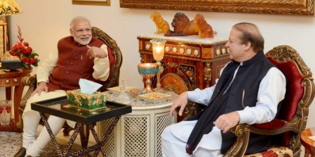 Pakistani Prime Minister Nawaz Sharif (R) talks with his Indian counterpart Narendra Modi in Lahore, Pakistan, December 25, 2015. Modi arranged his landmark visit to Pakistan - the first by an Indian leader in a decade, at the last minute on Friday, a Pakistani official said. REUTERS/Press Information Department (PID)/Handout via Reuters ATTENTION EDITORS - FOR EDITORIAL USE ONLY. NOT FOR SALE FOR MARKETING OR ADVERTISING CAMPAIGNS. THIS IMAGE HAS BEEN SUPPLIED BY A THIRD PARTY. IT IS DISTRIBUTED, EXACTLY AS RECEIVED BY REUTERS, AS A SERVICE TO CLIENTS NO RESALES. NO ARCHIVE