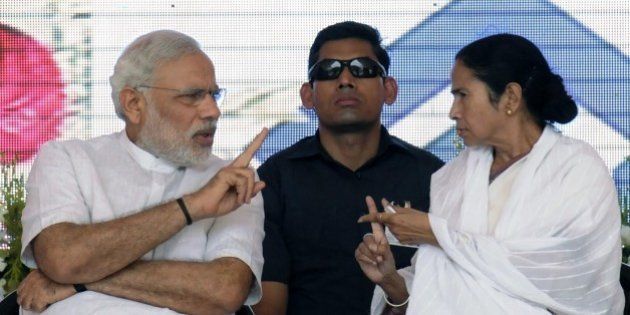 ASANSOL, INDIA - MAY 10: Prime Minister Narendra Modi and Chief Minister Mamata Banerjee during the inauguration of '2.5 MT modernized & expanded IISCO Steel Plant' at Burnpur Polo Ground in the district Burdwan of West Bengal, on May 10, 2015 in Asansol, India. During the function, Modi described the Union Government and 29 State Governments as 30 pillars of 'TEAM INDIA' which would take India forward. The upgraded steel plant of IISCO (Indian Iron and Steel Co) that has the country's largest blast furnace and has been modernised at a cost of Rs.16,000 crore. (Photo by Subhendu Ghosh/Hindustan Times via Getty Images)