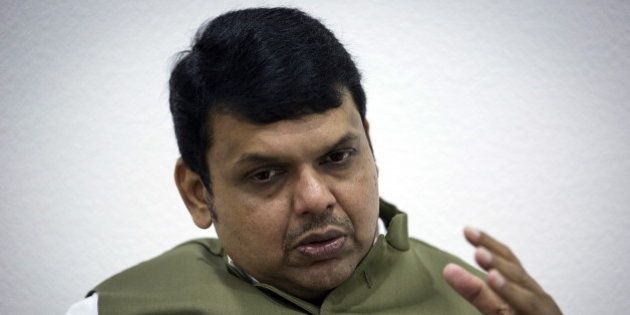 Maharashtra's chief minister Devendra Fadnavis speaks during an interview with Reuters at his official residence in Mumbai, India, July 9, 2015. India's wealthiest state plans to spend almost $16 billion over five to six years on a revamp of key infrastructure, reviving long-dormant projects including a Mumbai airport, a port and a key coastal road, Fadnavis said. Picture taken July 9, 2015. REUTERS/Danish Siddiqui