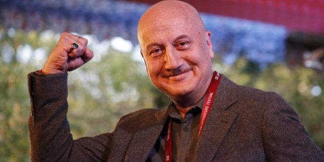 Bollywood actor Anupam Kher gestures to the audience during a session at the Jaipur Literature Festival at Jaipur, Rajasthan state, India, Monday, Jan.25, 2016. (AP Photo/ Deepak Sharma)